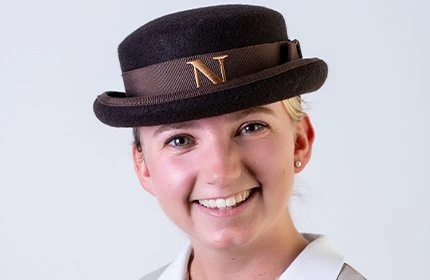 female headshot in Norland nanny uniform