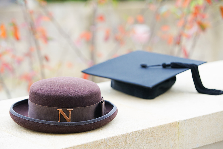 Norland hat and mortarboard showing the degree and diploma elements of our early years course