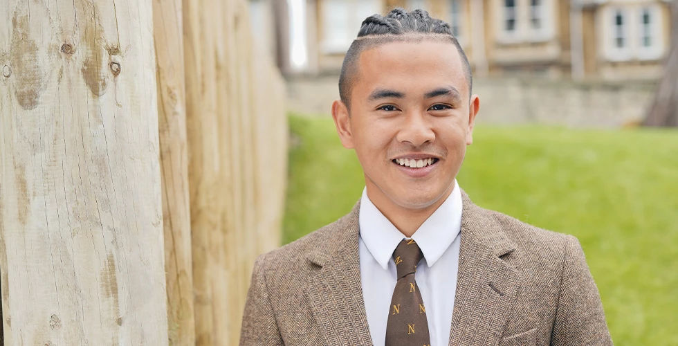 male headshot in Norland nanny uniform