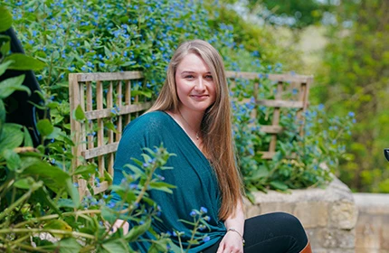 female headshot in garden