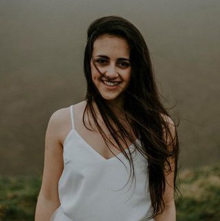 image of girl in white top