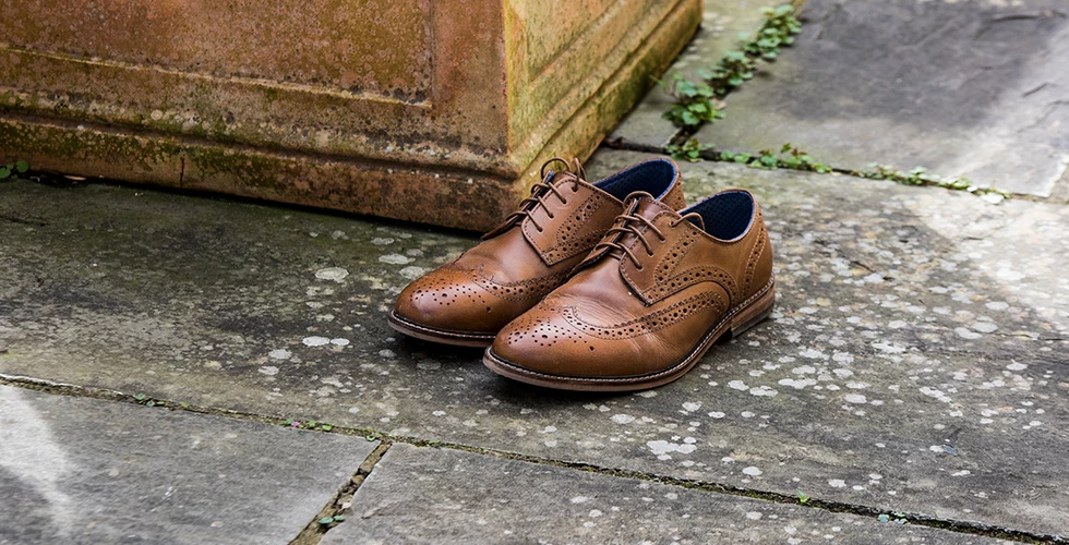 pair of brown brogues