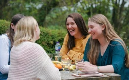 Women sitting at table