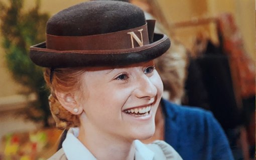 woman laughing in Norland hat