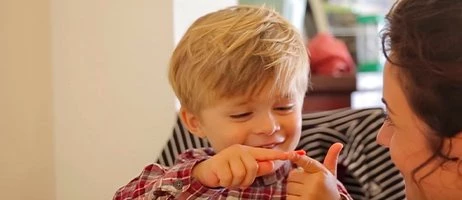 child and nanny interacting