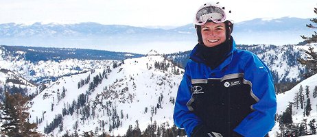 ski instructor on top of mountain