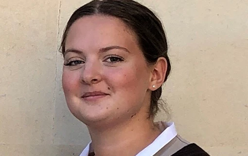 a female student smiling