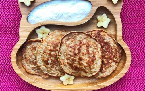 pancakes on a wooden children's plate