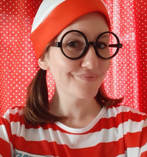 a lady dressed up as Where's Wally