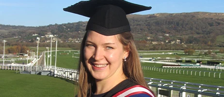 a female Norland student at her graduation