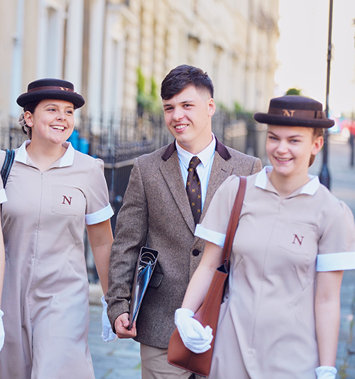students walking down the street in their formal uniform