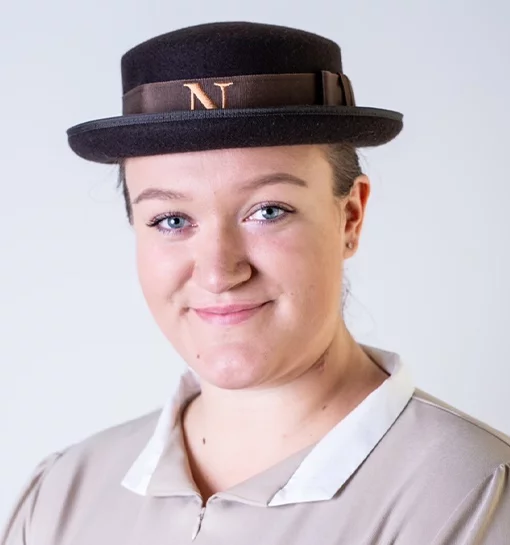 a female Norland student in her uniform