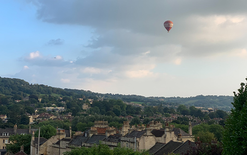 a photo of a Bath skyline and a hot air balloon