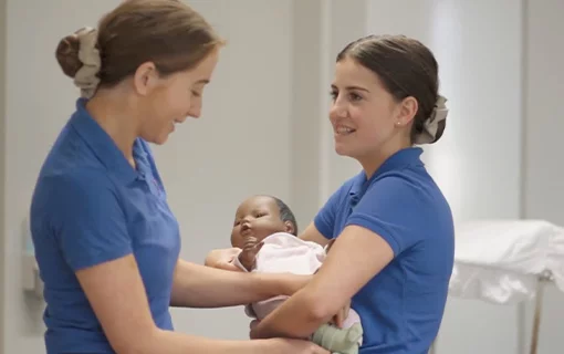 Norland Nanny students with a virtual baby