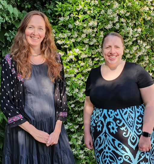 two women smiling