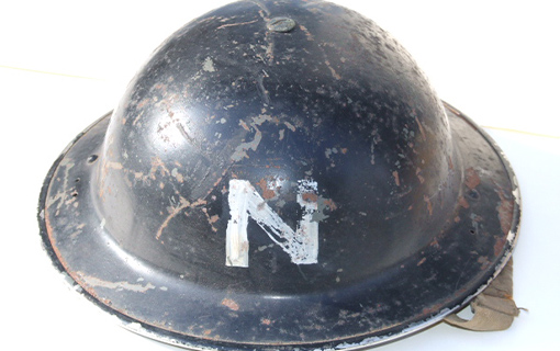 a helmet with an 'N' on it that was worn in the Blitz