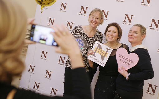 a group of people having their photo taken