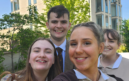 A group selfie with Norland Nanny students at a Norland Open Day