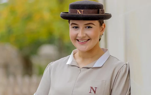 A female Norland Nanny student smiling