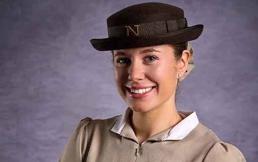 A female Norland Nanny student smiling