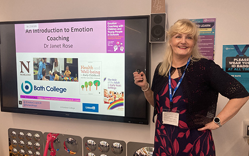 Dr Janet Rose presenting a talk on emotion coaching