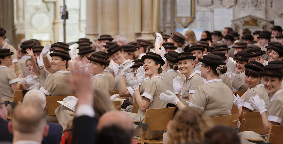 Norland Nannies clapping and smiling in the Bath Abbey