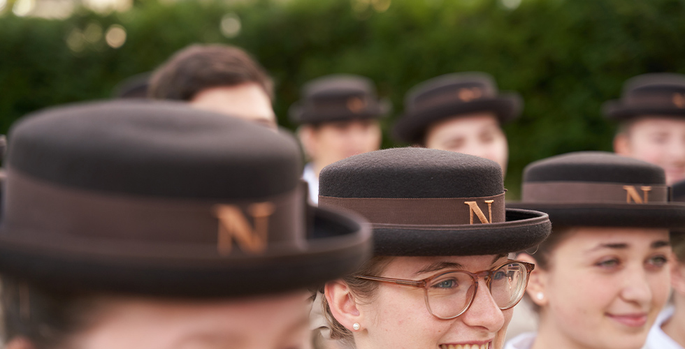 Norland students wearing the iconic Norland hat