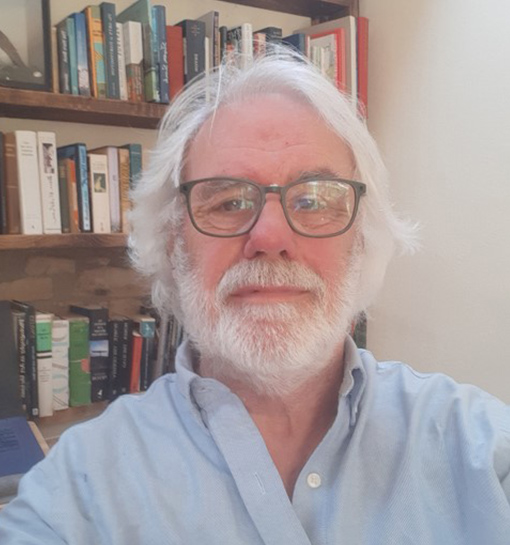 Image of Dr Christopher Turner smiling to camera