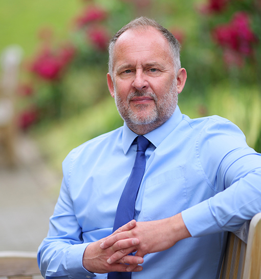 An image of Antony Wainer, Student Support Officer at Norland, smiling