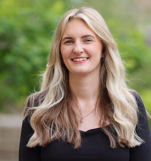 An image of Coral Clarke, Accommodation and Welfare Officer at Norland, smiling