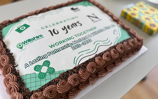 Cake to celebrate Wiltshire First Aid and Norland partnership