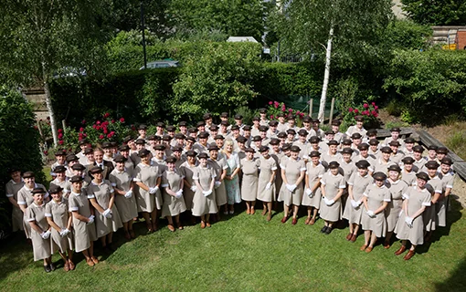 Set 46 students in formal uniform in whole set photo