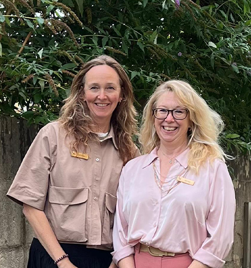 Kate Jaeger and Samantha Gay, staff at Norland, stood smiling