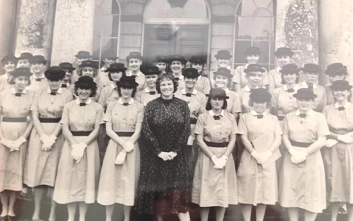 Vintage photo of Norland students and teacher