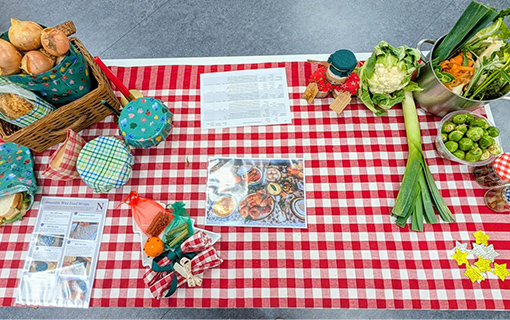 Table display of food and recipes at sustainable Christmas event