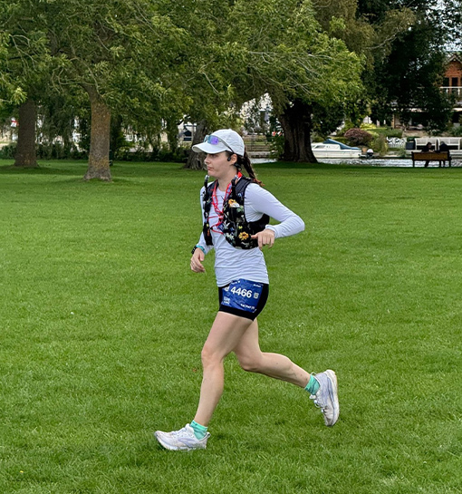 A lady running in a park