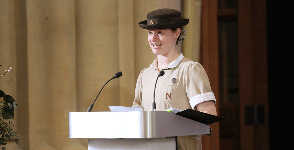 Student in Norland uniform giving valedictorian