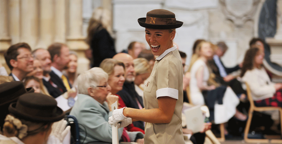 Norland Nanny smiling at graduation ceremony