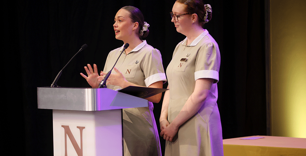 Head and deputy head of third year giving speech at heritage day