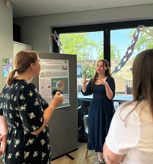Student presenting research at Norland research conference