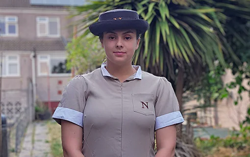 Star, a Norland University student in her first year, stood in her formal uniform