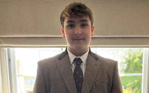 William, a first-year student at Norland University of Early Childhood, stood in his formal uniform