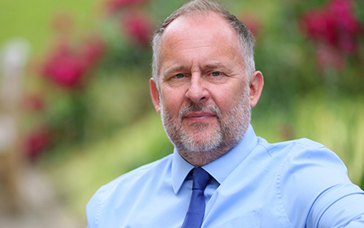 An image of Antony Wainer, Student Support Officer at Norland, smiling